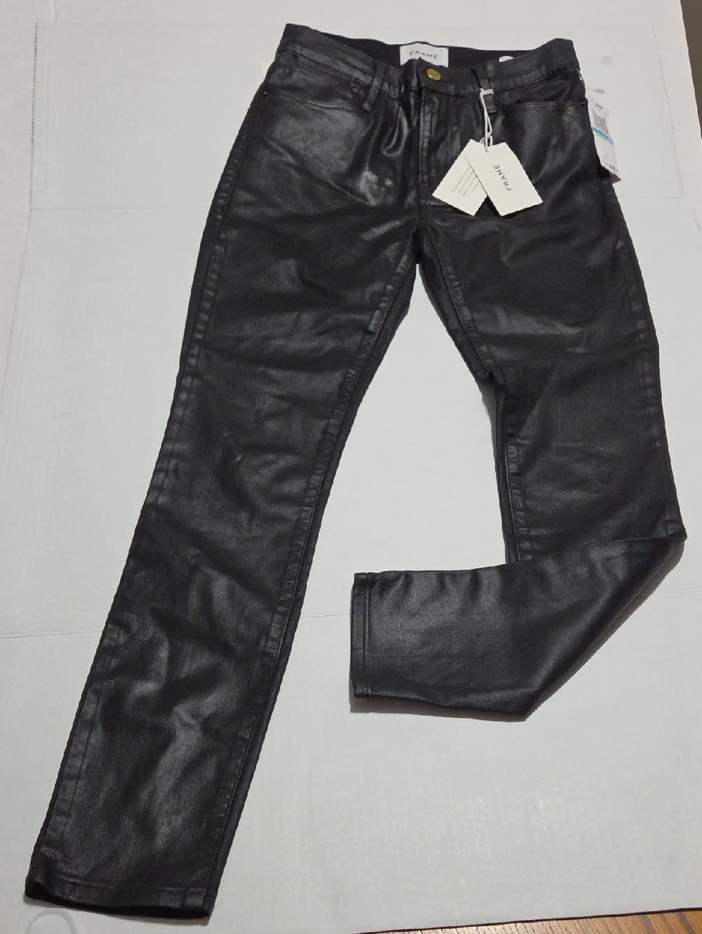 Frame Denim Black Coated Skinny Jeans..retails $240..NEW WITH TAGS